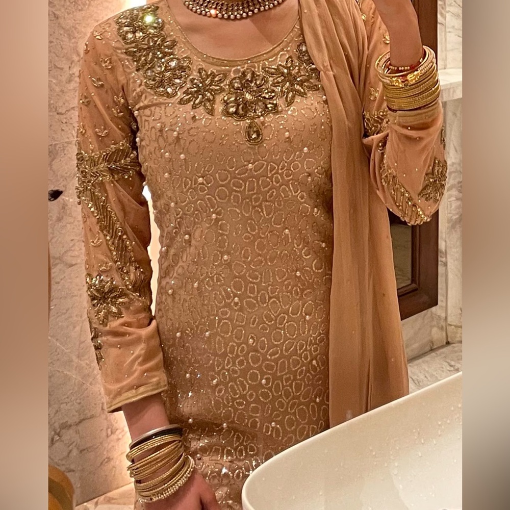 Gold Indian Pakistani outfit